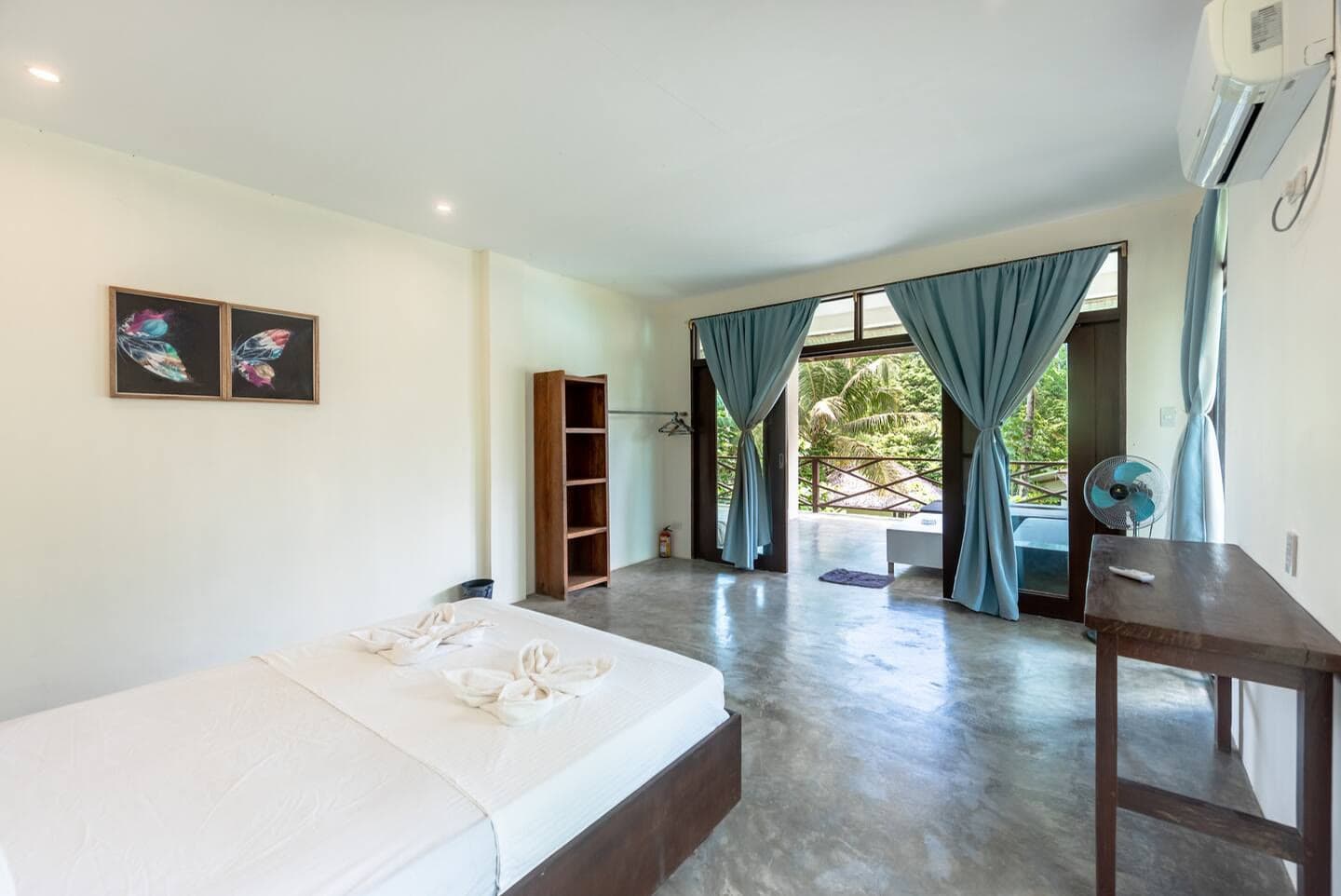 Room with a private balcony at Ohana Resort Siargao